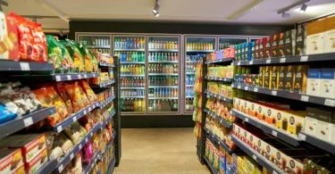 A convenience store and a grocery store are two kinds of retail stores that supply food and other home products. Even though these two descriptions are usually utilized interchangeably, some slight differences exist between them. The primary difference between a convenience store and a grocery store is the kinds of food they trade; convenience store trade staple food that is parceled, while grocery stores sell fresh products, which includes meat, fruits, and vegetables.